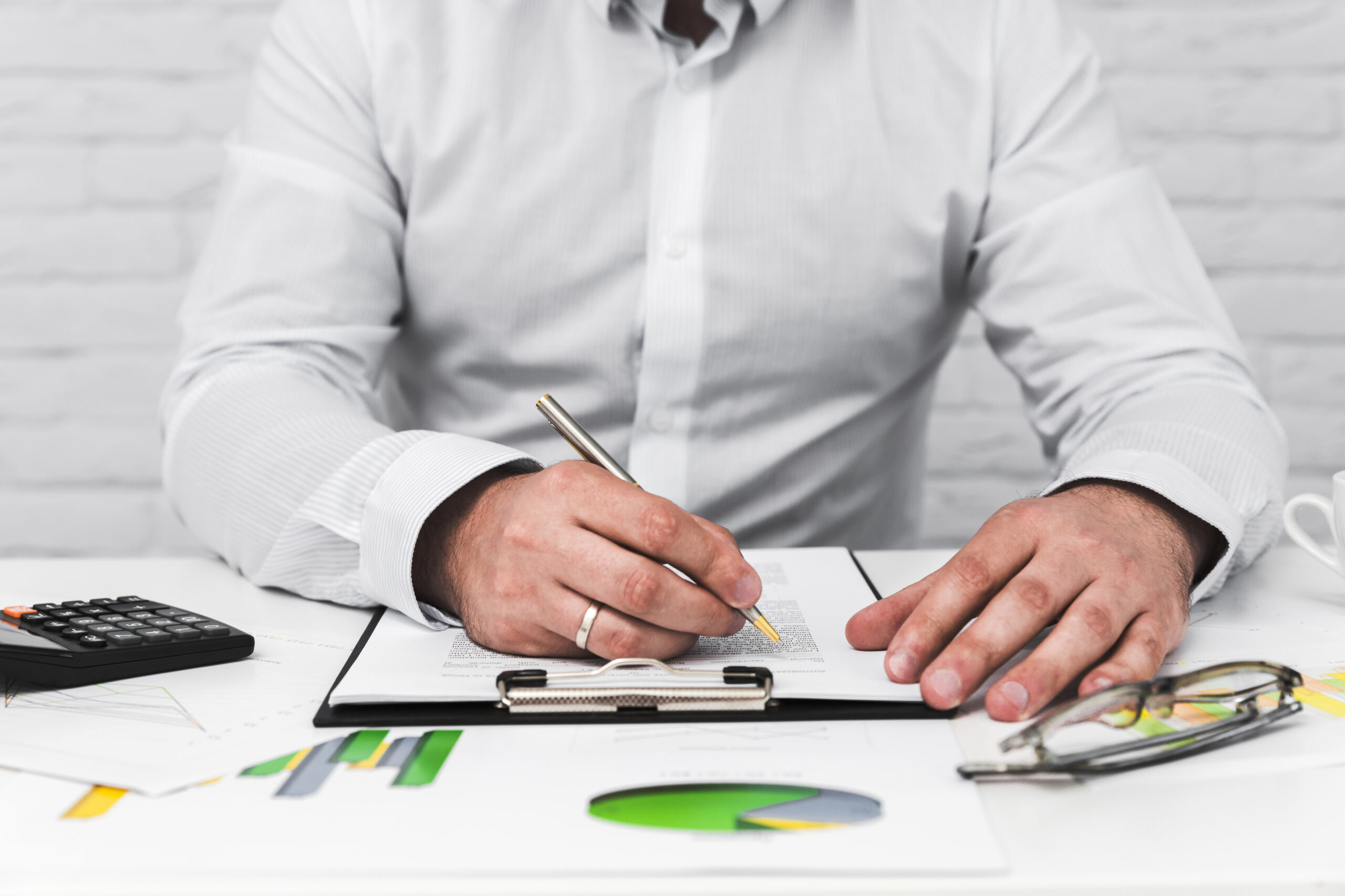 Business man working office desktop scaled